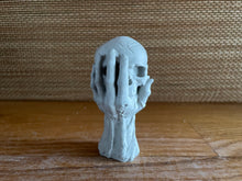 Load image into Gallery viewer, Cement Skull in Hand | 4 inch | HANDMADE | JLK